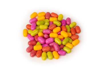 Sweet multicolored candies isolated on white background.