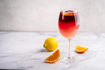 Glass of red wine spanish famous traditional fruity sangria gourmet cocktail or vino de verano, tinto de verano drink. High quality photo