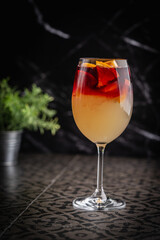 Glass of red wine spanish famous traditional fruity sangria gourmet cocktail or vino de verano, tinto de verano drink. High quality photo