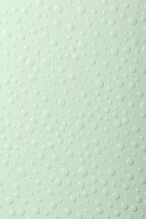 Light green background with water drops. Banner with raindrops. Top view.