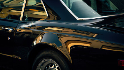 Fototapeta premium an elegant car, partially visible from behind, Taillights, dark tinted rear and side windows,