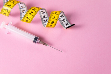 syringe and needle with tape measure