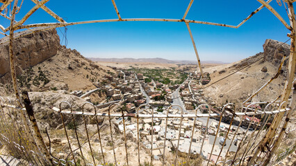 Panoramic View of a Rocky Valley Town
