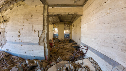 Abandoned Building Interior with Crumbling Walls