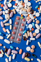 pills on a blue background