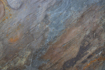 Textured Layered Stone Background with Rust Colors. Abstract Rock Surface