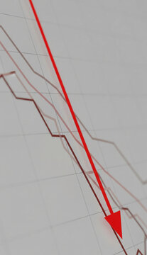 Close-up of downward trending lines graph, sharp red arrow pointing down, illustrating decline, fall, or loss, symbolizing economic downturn or market decrease