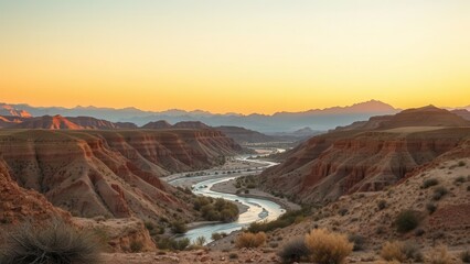 Winding River Through Pink Desert Mountains
