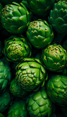 Fresh green artichokes arranged in a close-up display