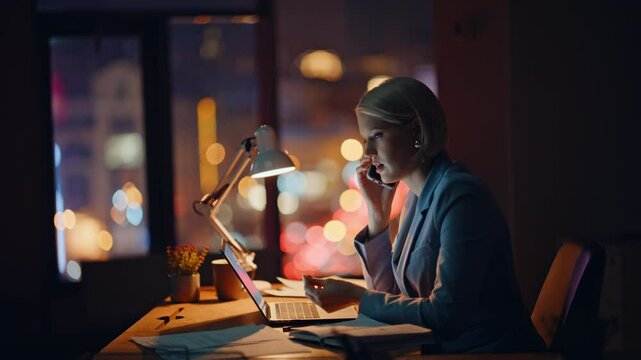 Calling manager hardworking late flipping notebook at night agency workplace
