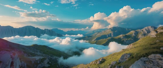 Obraz premium Clouds drift across the rugged yet scenic landscape in this beautiful accessible mountainous region during summer months, with space for text.