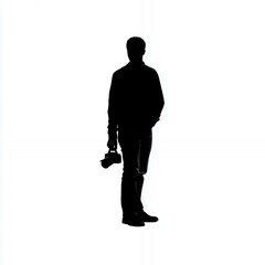 Fototapeta premium A man in a black jacket is holding a camera. He is standing on a white background