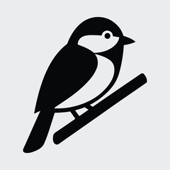 Silhouette of a bird perched on a branch Vector illustration