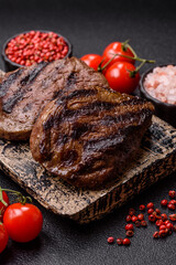 Grilled beef steak meat with salt and pepper. Beef steak grilled on a barbecue