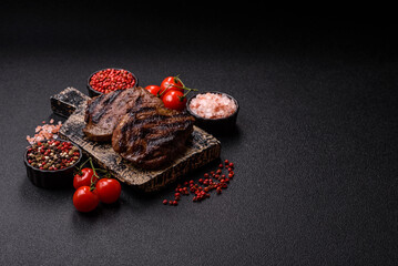 Grilled beef steak meat with salt and pepper. Beef steak grilled on a barbecue