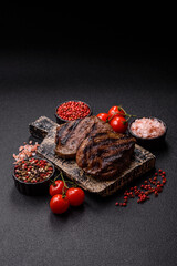 Grilled beef steak meat with salt and pepper. Beef steak grilled on a barbecue
