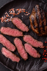 Grilled beef steak meat with salt and pepper. Beef steak grilled on a barbecue