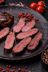 Grilled beef steak meat with salt and pepper. Beef steak grilled on a barbecue