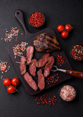 Grilled beef steak meat with salt and pepper. Beef steak grilled on a barbecue