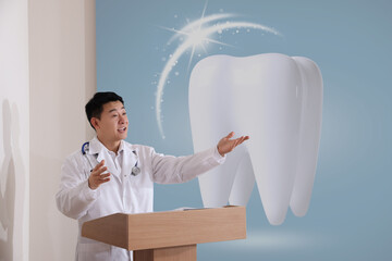Healthcare professional giving lecture about dentistry in conference room using video projector....