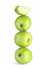 Green apples stacked on top of each other against white background. Balance