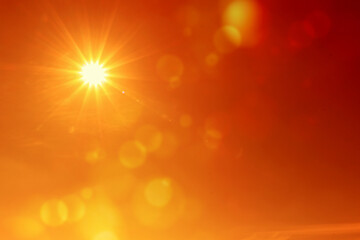 Bright sun in orange sky during hot summer weather. Extremely high temperature