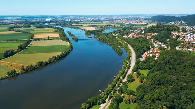 Walhalla memorial near Regensburg captured from a drone on a sunny day, perched above the Danube River with classical architecture and panoramic views of the Bavarian countryside