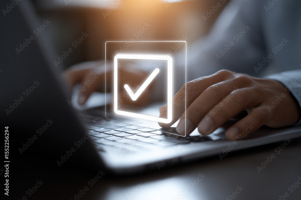 Poster Close-up of a person's hands typing on a laptop keyboard with a digital checkmark icon overlay symbolizing approval or task completion in a modern workspace setting