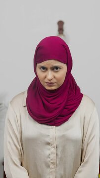 Vertical Video of Muslim Woman in Hijab Scarf Feeling Guilty