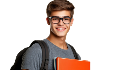 Young male student smiling confidently while holding books and wearing glasses against a plain background for educational themes and back-to-school concepts
