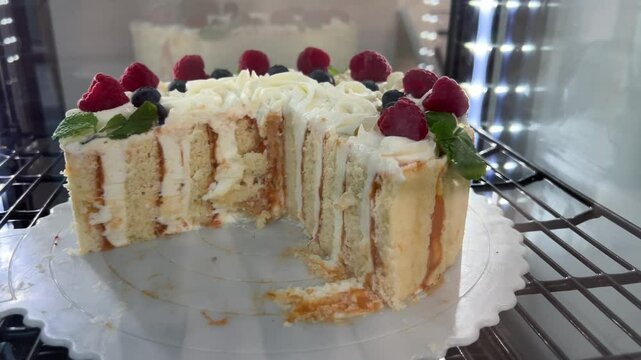 vertical cakes slice of pink colored puff cake for a birthday celebration. Sweets to celebrate a wedding or valentine's day