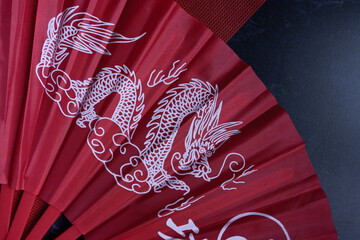 Cultural display of Chinese items and lucky colors on a decorated table