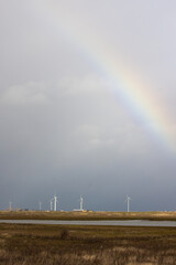 rainbow over windfarm