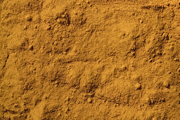 Turmeric powder background. Macro. Top view