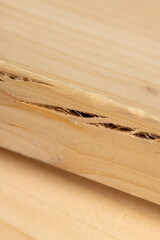 one old wooden board with cracks, a pine wood board cracked during operation, close up