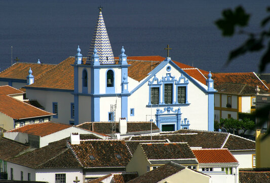Fototapeta Portugal, Azores Islands, Terceira Island. Blue and white painted, Baroque church and rooftops in the capital Angra do Heroismo. UNESCO World heritage site.