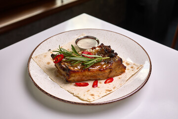 Grilled pork ribs with rosemary and chili