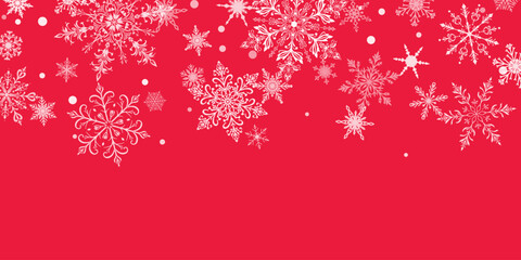 Christmas illustration featuring intricate falling snowflakes of varying sizes and designs arranged on top, white on red background.