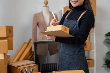 Woman Fulfilling Online Orders at Home
