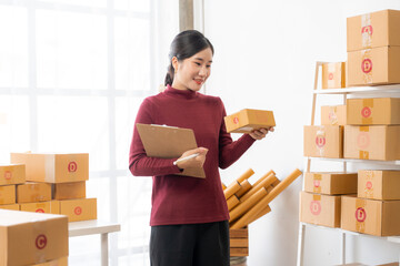 Woman Preparing Packages for Shipment