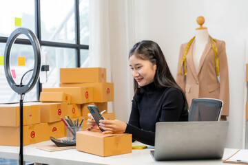 Asian Woman Selling Online from Home