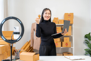 Asian Woman Running Online Business