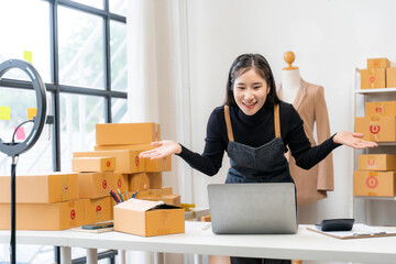 Woman Entrepreneur Packing Orders for Online Business