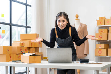 Asian Woman Running Online Business From Home