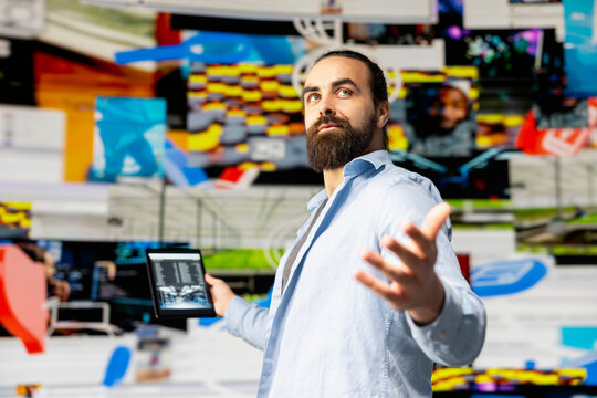 Successful content creator enjoying life on social media platforms, celebrating his achievement in gaining followers and dominating the digital world of social networking. Empowerment. - Powered by Adobe