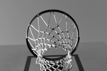 basketball hoop on a black background © Niccole