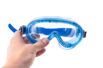 Blue swimming goggles held in a hand against a black background ready for a refreshing dive