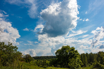 View of white cumulus clouds floating in blue sky