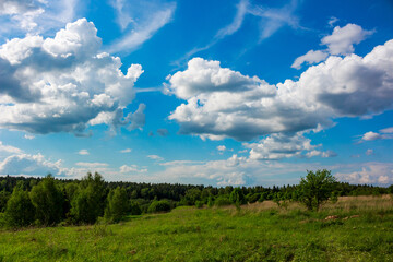 View of white cumulus clouds floating in blue sky