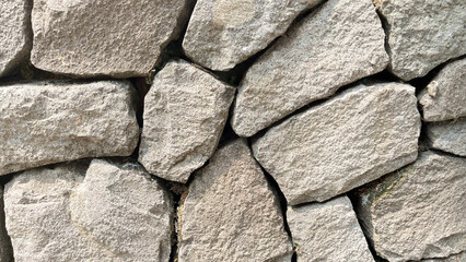 background of stones arranged as a wall